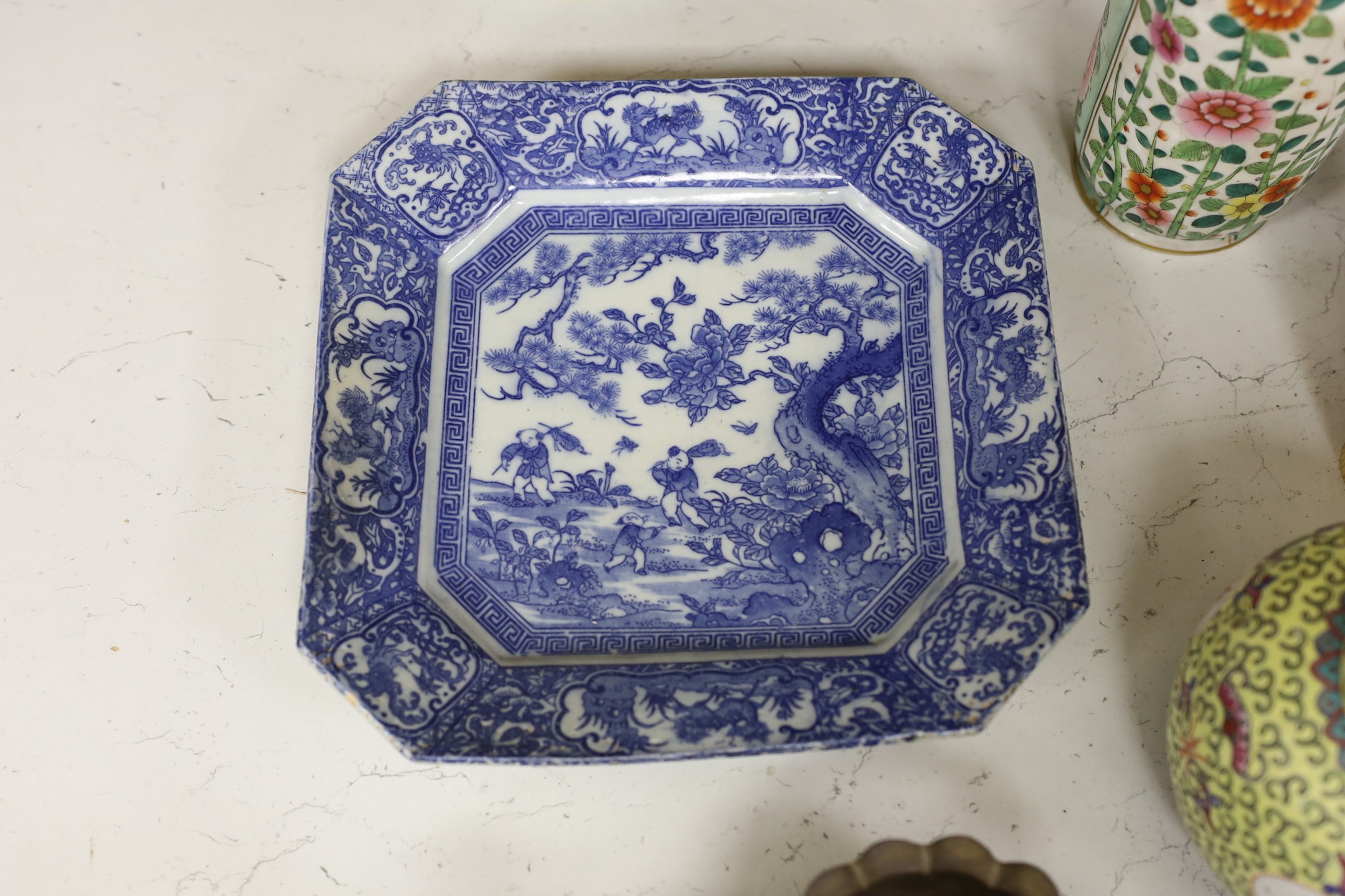 A collection of mostly Chinese ceramics, to include a vase, a lion dog, pestle and mortar etc.
